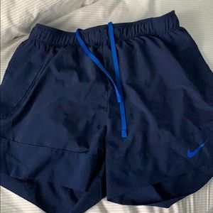 W Nike Shorts with built in compression spandex.